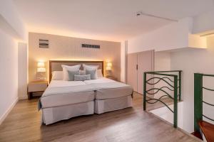 Postel nebo postele na pokoji v ubytování Alua Atlantico Golf - All Inclusive