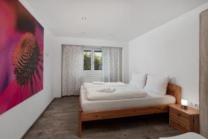Postel nebo postele na pokoji v ubytování Alpine View Apartments