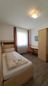 Postel nebo postele na pokoji v ubytování Hotel Central Hauptbahnhof