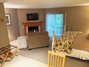 Ένα ή περισσότερα κρεβάτια σε δωμάτιο στο Springbrook Inn- Springbrook