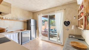 Η κουζίνα ή μικρή κουζίνα στο Vista Azul Duplex 1