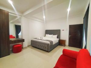 Postel nebo postele na pokoji v ubytování Carstenzs Home Kuta + 35 fotografií