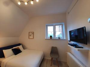 Μια τηλεόραση ή/και κέντρο ψυχαγωγίας στο NW Mini Studio NEPTUN II