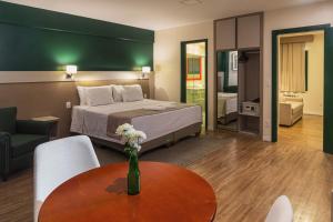 Cama ou camas em um quarto em Hotel Fioreze Origem