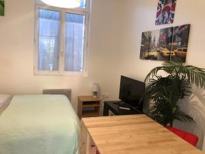 Photo de la galerie de l'établissement La rivière (appartement 25m2 ), à Lisieux