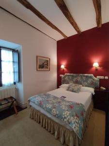Postel nebo postele na pokoji v ubytování Churrut Hotel