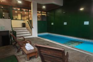 A piscina localizada em Hotel Fioreze Origem ou nos arredores
