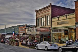 a city street with cars parked in front of buildings at Black Rock Ridge 14544 in Kamas