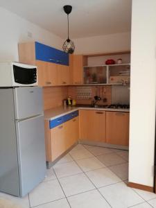 Kuchyň nebo kuchyňský kout v ubytování HomeSweetHome + 2 fotografie
