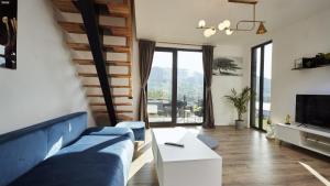 TV a/nebo společenská místnost v ubytování Blissful Resort - Valea Doftanei