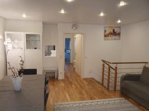 Posezení v ubytování 80m2 Garten-Duplexwohnung in Altperlach