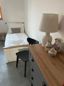 Postel nebo postele na pokoji v ubytování Penzion U Blechy a Švába