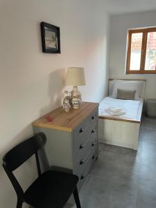 Postel nebo postele na pokoji v ubytování Penzion U Blechy a Švába