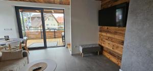 Μια τηλεόραση ή/και κέντρο ψυχαγωγίας στο Apartmány Kúty
