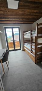 Ένα ή περισσότερα κρεβάτια σε δωμάτιο στο Apartmány Kúty