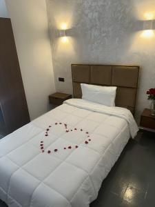 Postel nebo postele na pokoji v ubytování Hotel De Provence