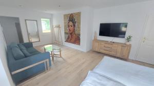 TV a/nebo společenská místnost v ubytování Haus Moritzburg