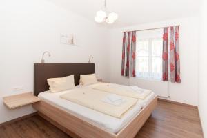 Postel nebo postele na pokoji v ubytování Restaurant - Café - Pension HASSLER