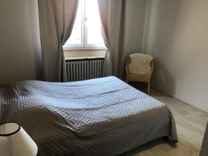 Postel nebo postele na pokoji v ubytování Appartement à l'ange + 13 fotografií