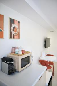Kuchyň nebo kuchyňský kout v ubytování Suite l'Aparté