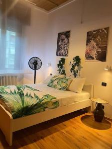 a bedroom with a bed in a room at via Manara 3 in Cantù +13 photos