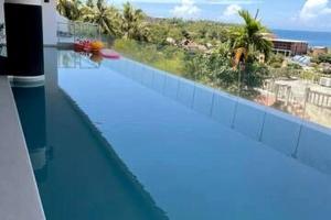 Balkón nebo terasa v ubytování B14 Pool Access Partial Seaview 2brs 1 bath at Karon