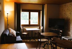 Posezení v ubytování Bonne Auberge Les Bugnenets