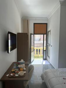 Postel nebo postele na pokoji v ubytování Hotel De Provence