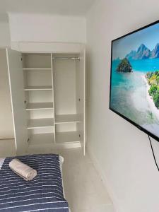TV a/nebo společenská místnost v ubytování Maison de pêcheur Presqu'île Séné