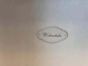 a sign on a wall that reads walhalla at Ferienhaus mit Bar und Sauna in Duderstadt