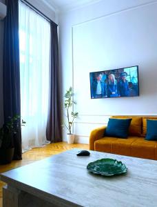 TV a/nebo společenská místnost v ubytování Art Hotel Tabidze