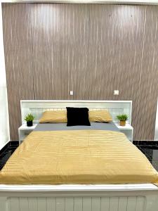 Ένα ή περισσότερα κρεβάτια σε δωμάτιο στο Appartement Prestige Avec Balcon