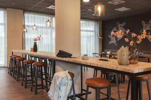 A restaurant or other place to eat at Holiday Inn - the niu Tab Dusseldorf Main Station by IHG