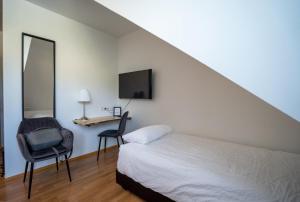 Postel nebo postele na pokoji v ubytování Hotel Breiddalsvik