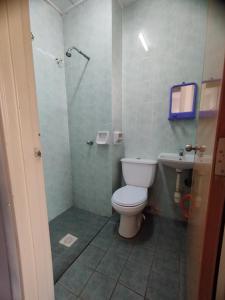 Koupelna v ubytování Shamila Islamic Homestay