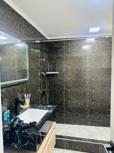 Vannituba majutusasutuses Family Hotel - White House Racha