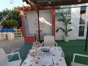 Balkón nebo terasa v ubytování B&B il MENHIR