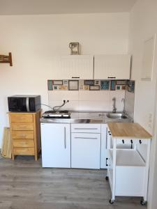Η κουζίνα ή μικρή κουζίνα στο private room central
