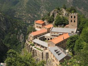 a group of buildings on the side of a mountain at Belle maison Catalan, rénovée entièrement 2023 in Eus