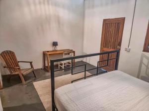 Postel nebo postele na pokoji v ubytování Casa de Olas Hostel