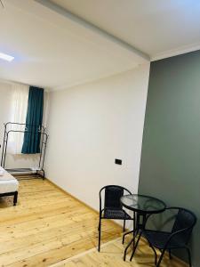 Istumisnurk majutusasutuses Family Hotel - White House Racha