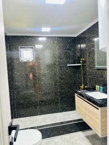 Vannituba majutusasutuses Family Hotel - White House Racha