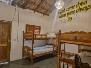 Postel nebo postele na pokoji v ubytování Casa de Olas Hostel