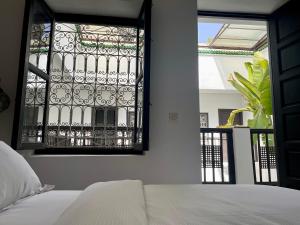 Postel nebo postele na pokoji v ubytování Riad Awatif le 36 + 37 fotografií