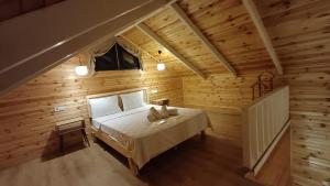 Postel nebo postele na pokoji v ubytování THEA Sapanca Bungalov