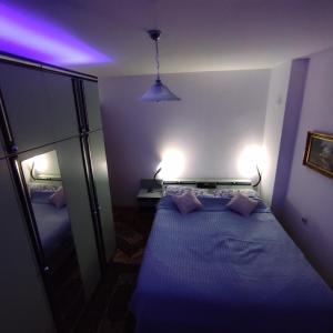 A bed or beds in a room at Sunčana strana