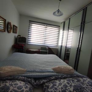 A bed or beds in a room at Sunčana strana
