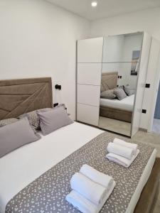 Posteľ alebo postele v izbe v ubytovaní Lavanda Centar Makarska
