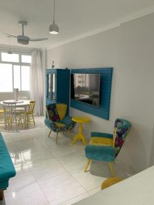 Χώρος καθιστικού στο Apartamento Pitangueiras Blue