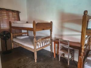 Postel nebo postele na pokoji v ubytování Casa de Olas Hostel